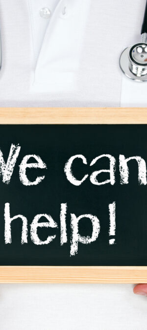 doctor holding help sign