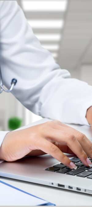 doctor working on laptop