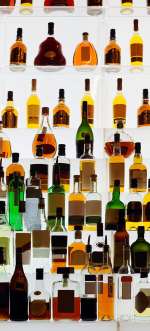 drink bottles on bar shelves