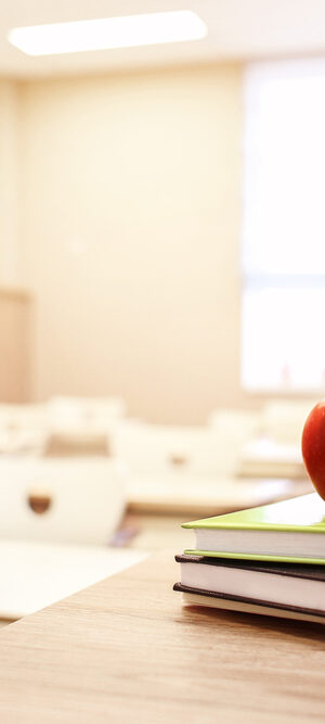 empty school classroom with apple