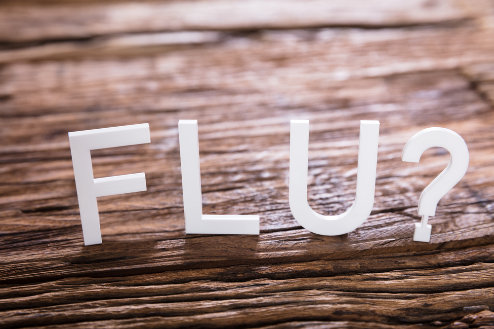 flu letters on wood