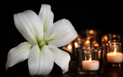 white flower and candles