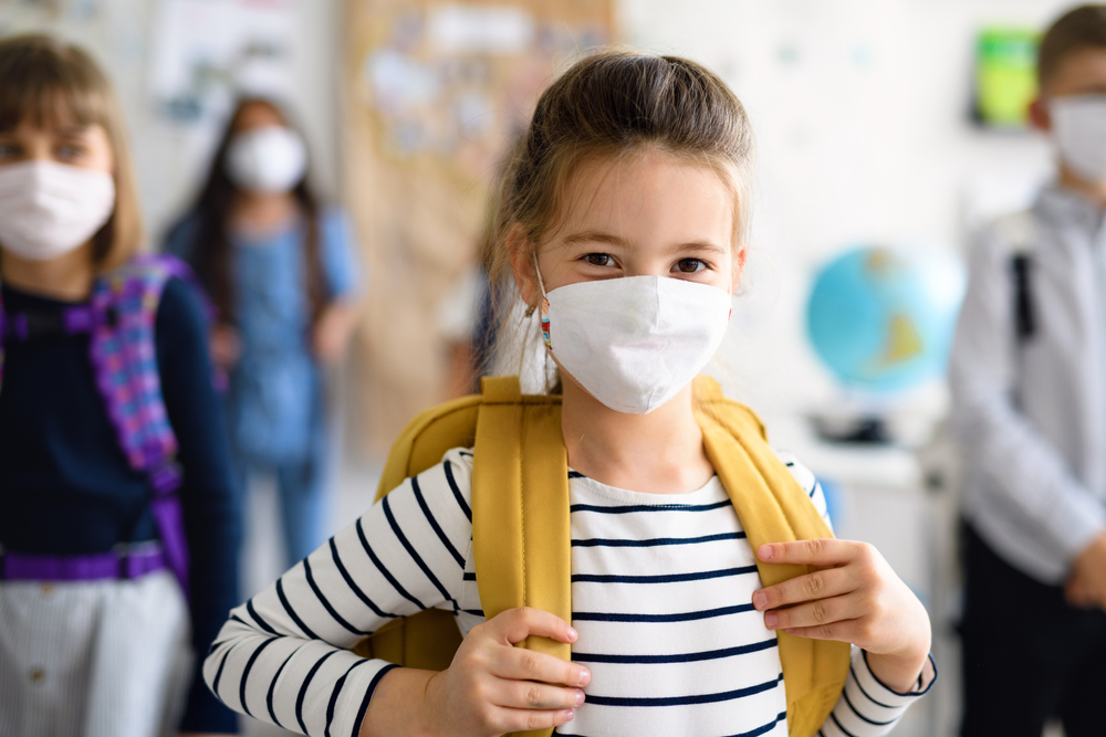 girl at school with mask