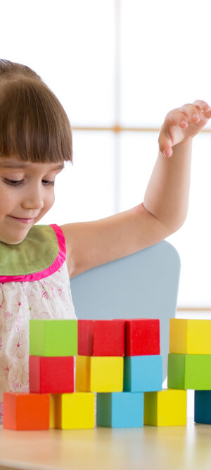 girl with colorful blocks