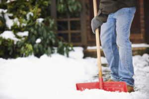 guy shoveling snow
