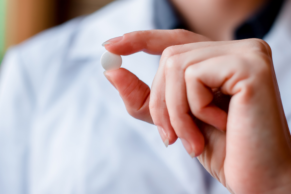 Hand Holding Medication Pill Wyoming Department Of Health