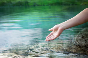 hand in water outdoors