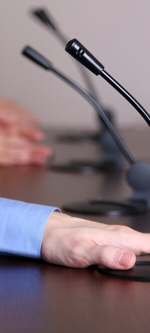 hands at a public meeting