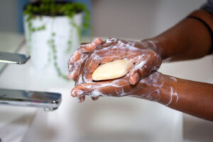 hands washing with bar soap