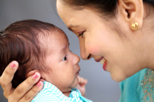 happy mom with newborn