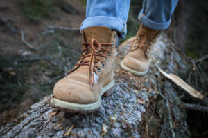 hiking feet on a log