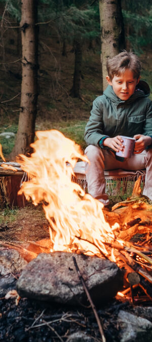 kid and dad with campfire