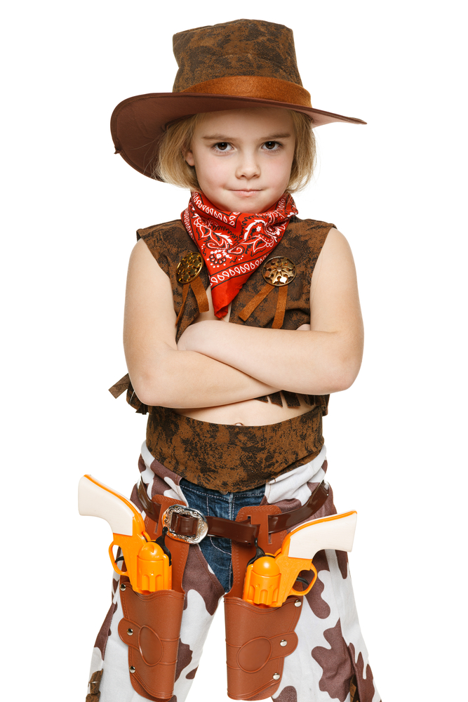 little girl in western costume