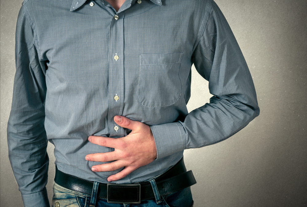 Man Holding Stomach Wyoming Department Of Health 5224