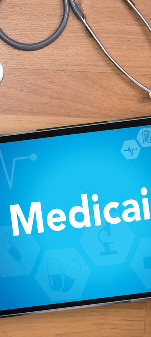 medicaid on tablet on desk