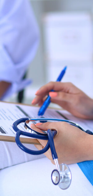 medical person with clipboard chart