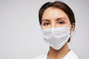 medical person with white mask