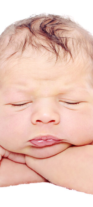 newborn baby with fat cheeks