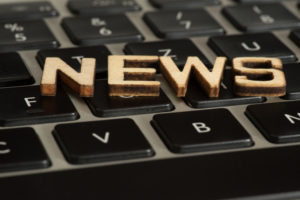 News letters on computer keyboard