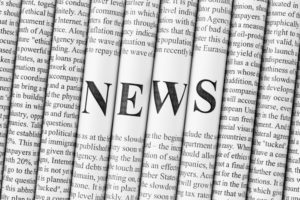 News word on folded papers