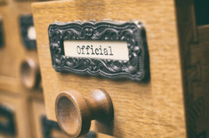 official tag on old drawer