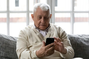 Older man using smartphone