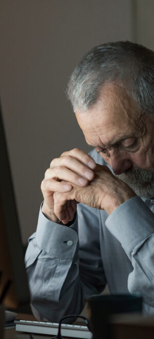 older man with computer