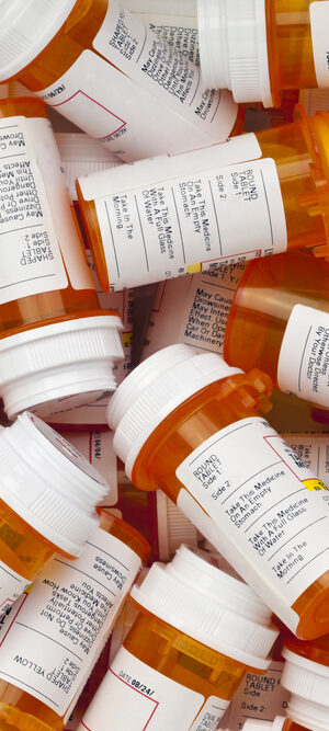 pile of medication bottles