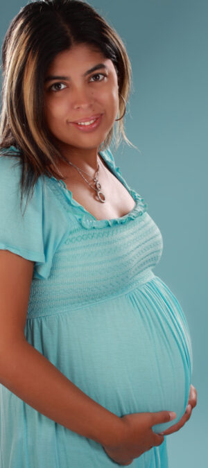 pregnant woman in turquoise dress