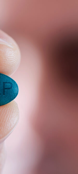 prep pill in fingers