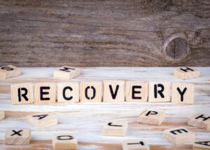 recovery word on wood tiles