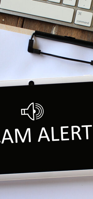 scam alert on tablet
