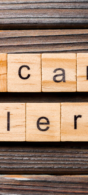 scam alert with wood tiles