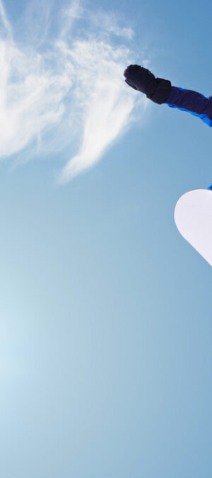 snowboarder with blue sky