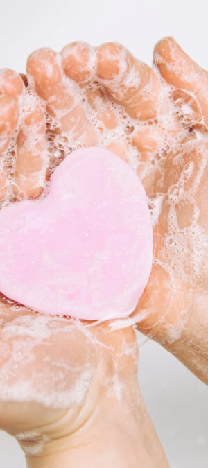 soapy hands with heart soap