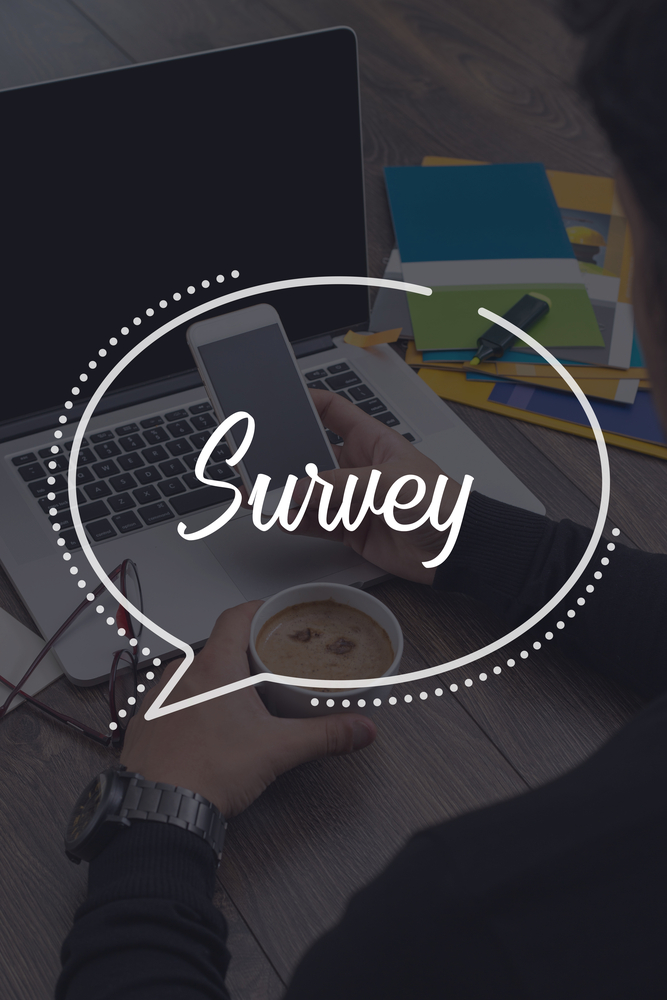 survey with dark desk backgroun