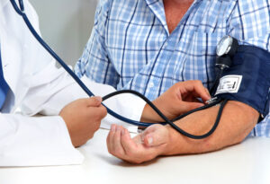 taking blood pressure with cuff