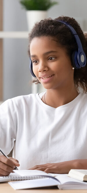 teen girl working on school lesson