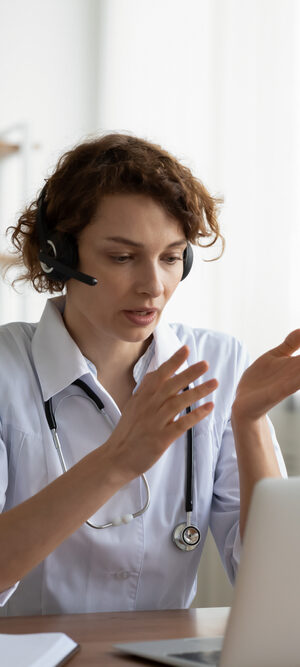 telehealth medical provider with laptop