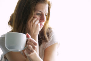 woman with coffee cup