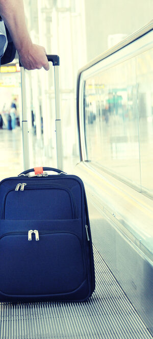 traveler with suitcase
