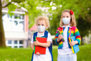 two young girls wearing face coverings for school - Wyoming Department ...