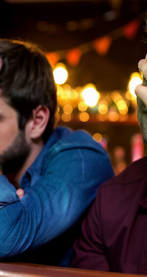 unhappy guys at bar