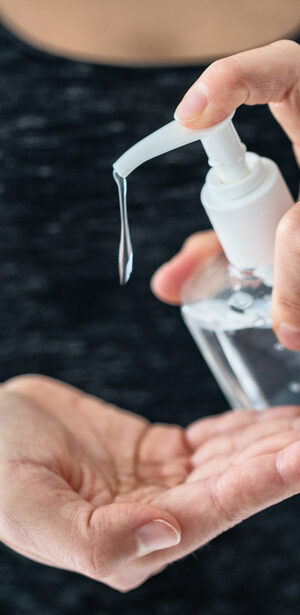 using hand sanitizer up close