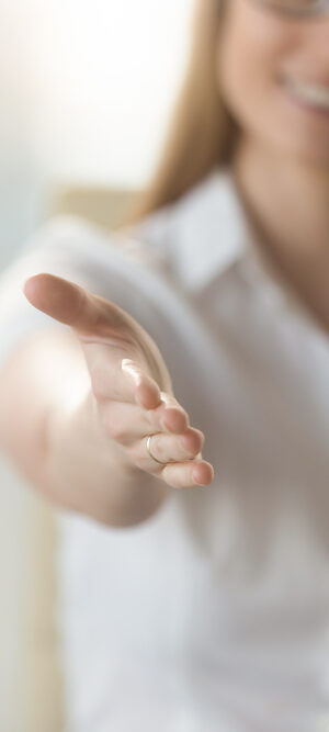 woman extending helping hand