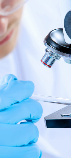 worker with lab microscope