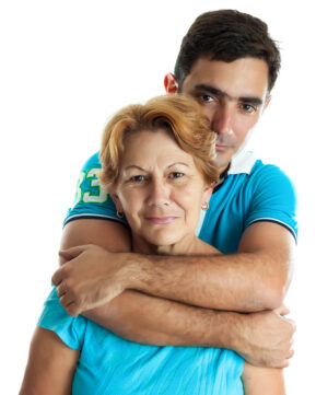 young man holding mom in hug