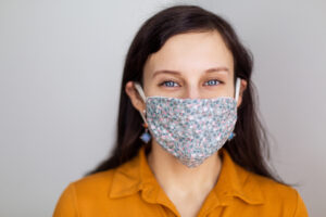 young woman wearing face covering 2