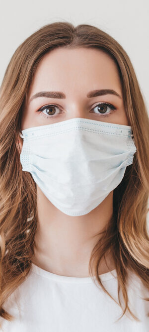 young woman with face covering