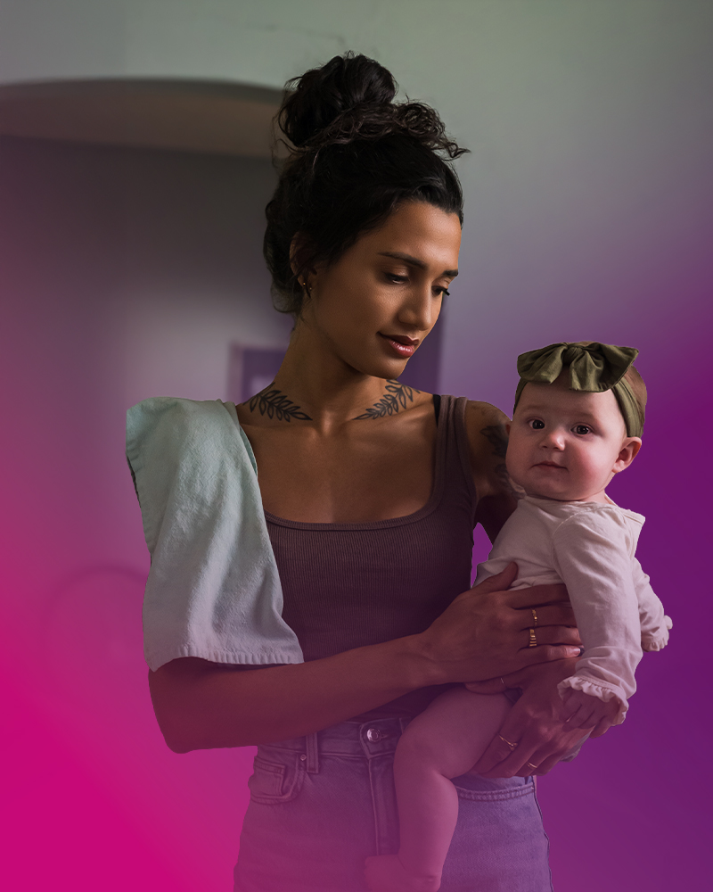A mom holding a baby